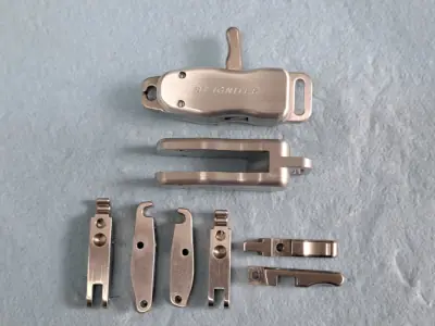 CNC machined archery trigger release mechanism with 7075 aluminum body and 304 stainless steel internal components